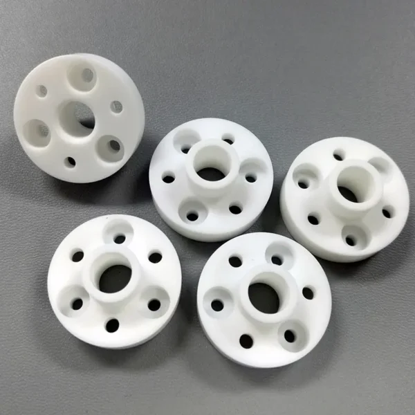 Machinable ceramic flange bushings — view 1 Machinable ceramic flange bushings — reference component view 1